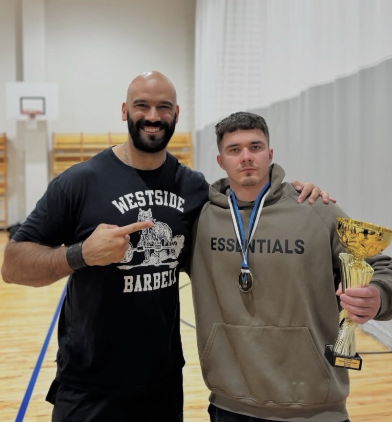Bryan Farani with powerlifter Carl-Joosep Zuranjuk after competition